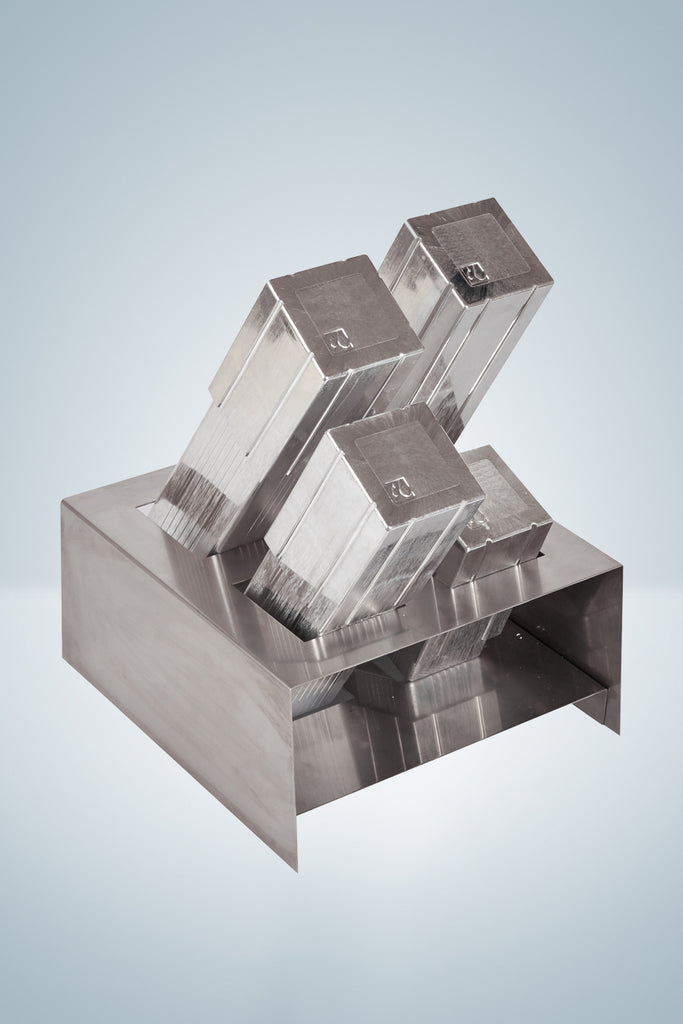 Stainless steel holder for pipette boxes